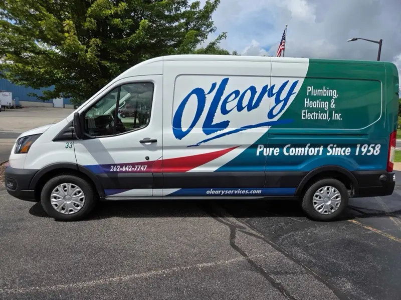 O'Leary Plumbing, Heating & Electrical branded service van — Pure Comfort Since 1958