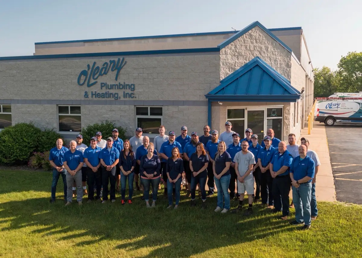 The O'Leary Plumbing, Heating & Electrical team — three generations of family-owned trade craft in Wisconsin's lake country