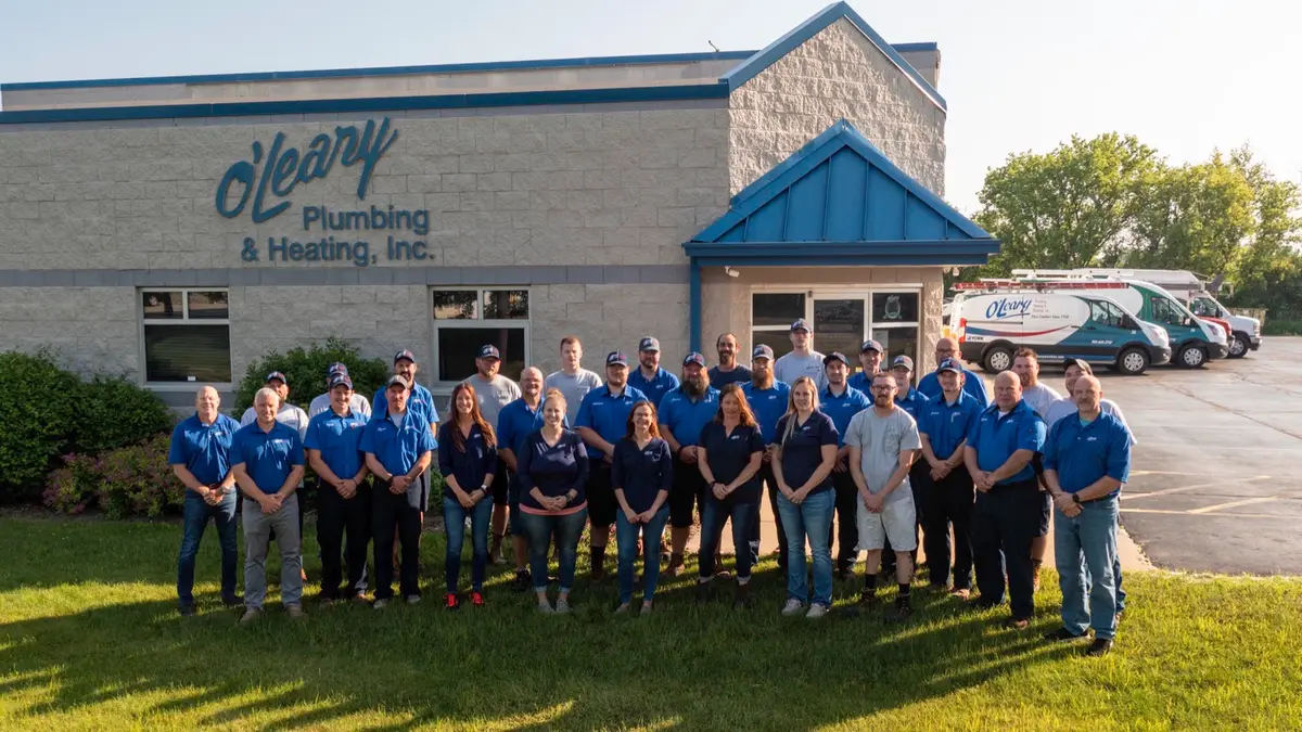 The O'Leary Plumbing, Heating & Electrical team — three generations of family-owned trade craft in Wisconsin's lake country