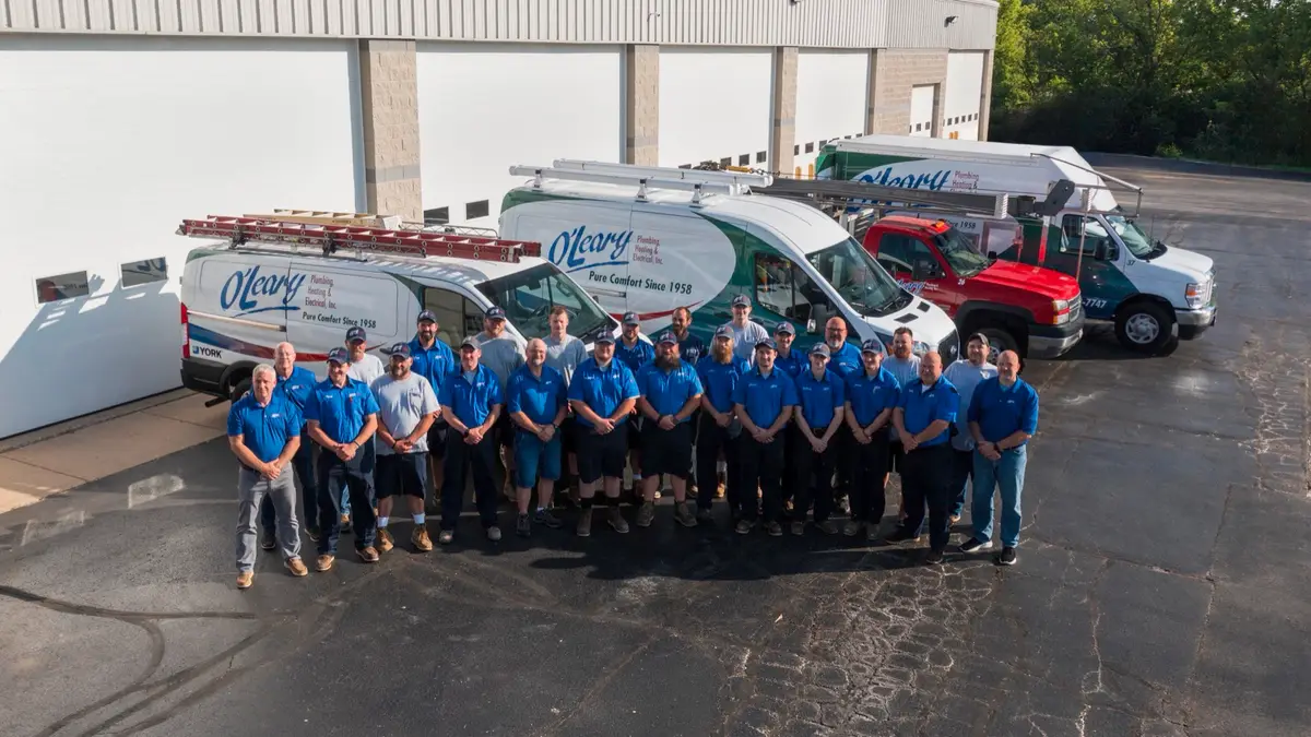 O'Leary Plumbing, Heating & Electrical service technicians and fleet